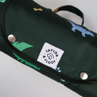 Assistance dog settle mat with dinosaur pattern by Taylor and Floof. Perfect training tool in dark green.