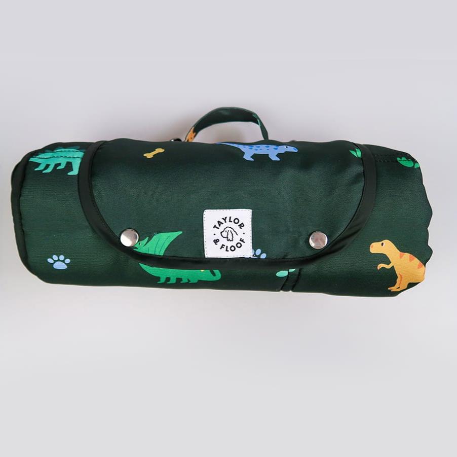 Taylor and Floof Jurassic Bark settle mat for dog training. Dark green design with dinosaur illustrations. Perfect assistance dog settle mat for training and travel.