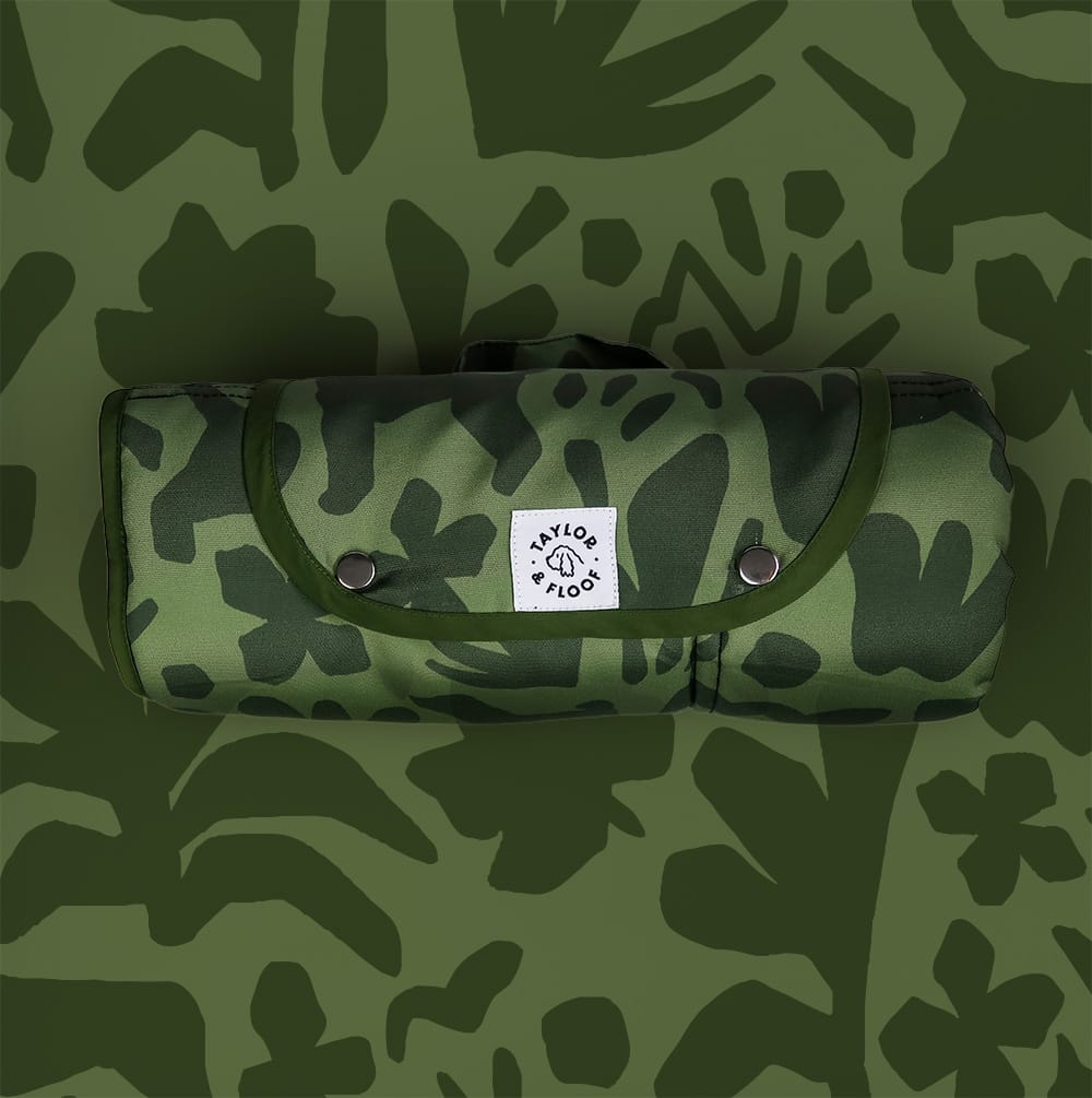 Dark green camo settle mat with dog illustrations, perfect for settle mat training and reactive dogs.