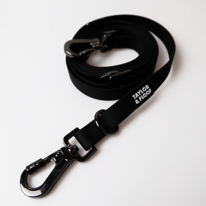 Black adjustable hands free dog leash perfect for walking or training. 