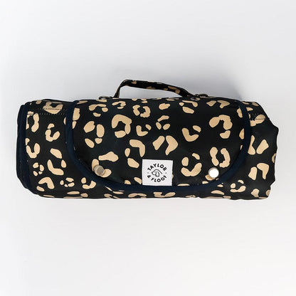 Wild Child dog settle mat with non-slip base, featuring a chic animal print design for stylish dog owners. Durable, easy-to-clean dog settle mat in Leopard print, crafted for use in training routines or as a comfortable resting space.